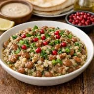 طريقة-عمل-سلطة فول متبّل بالباذنجان المشوي والطحينة تُقدَّم كطبق جانبي شرقي