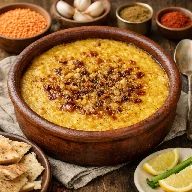 طريقة-عمل-طاجن عدس أصفر مصري مطهو بالثوم والكمون في الفرن بقوام كريمي وتقديم منزلي