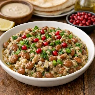 طريقة-عمل-سلطة فول متبّل بالباذنجان المشوي والطحينة تُقدَّم كطبق جانبي شرقي